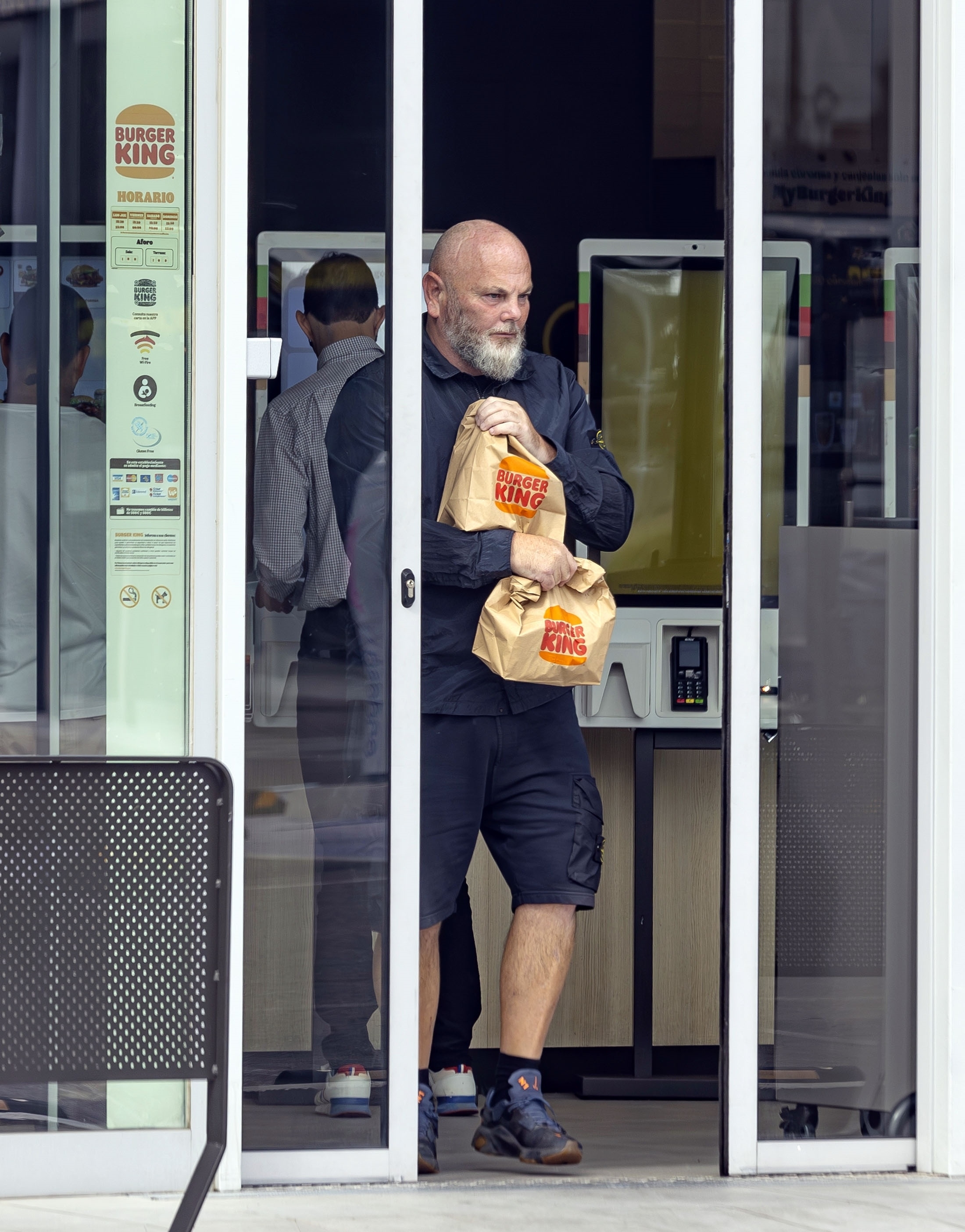 Greenwood and dad Andrew were seen collecting Burger King meals after his training session