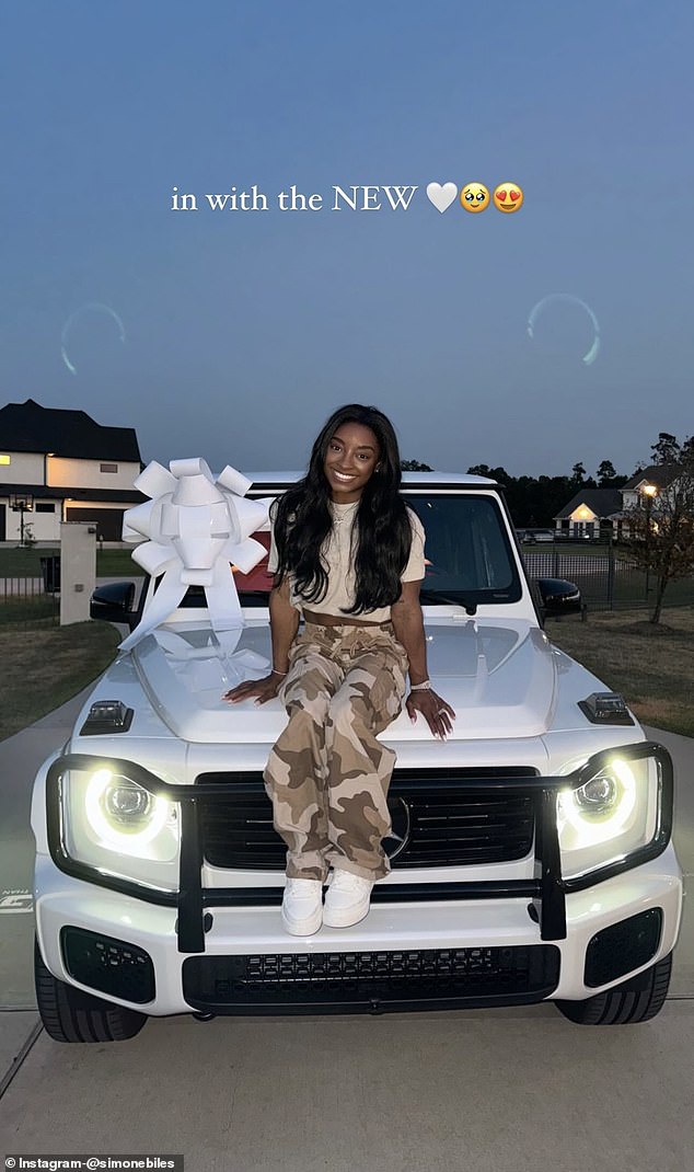 Simone Biles posted a photo of herself sitting on the hood of her new Mercedes G-Wagon