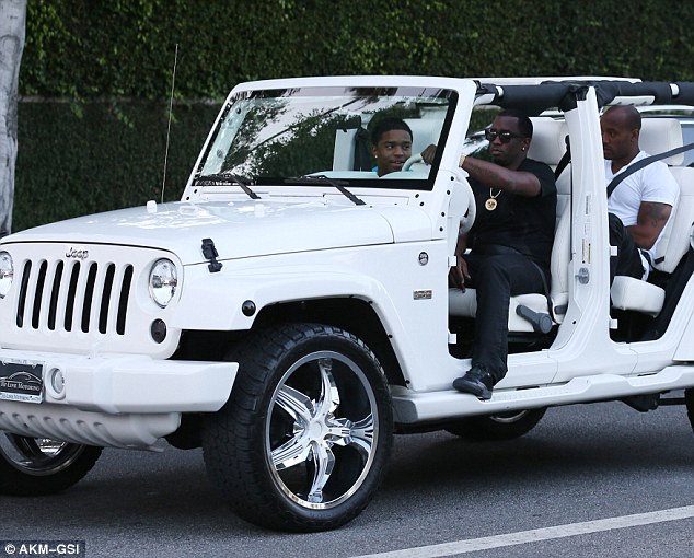 He's not Jeep: Multimillionaire Diddy took his boys for a ride in his doorless SUV in West Hollywood on Saturday