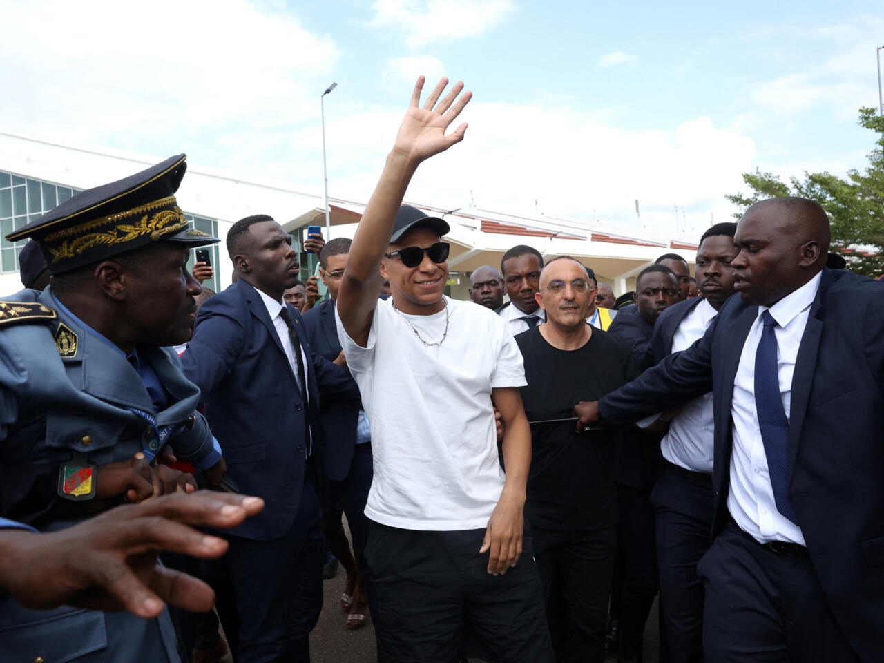 Our brother': French football star Mbappé visits father's native Cameroon