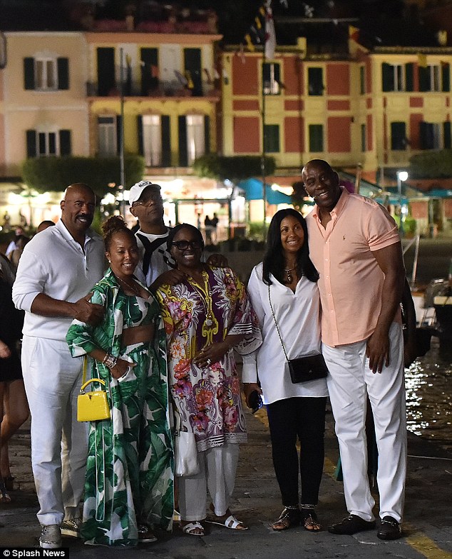 Water way to have fun: From left, pals Steve Harvey with wife Marjorie, Samuel L. Jackson and actress-producer wife LaTanya Richardson, and Magic Johnson and his wife Cookie celebrated July 4 in Portofino, Italy