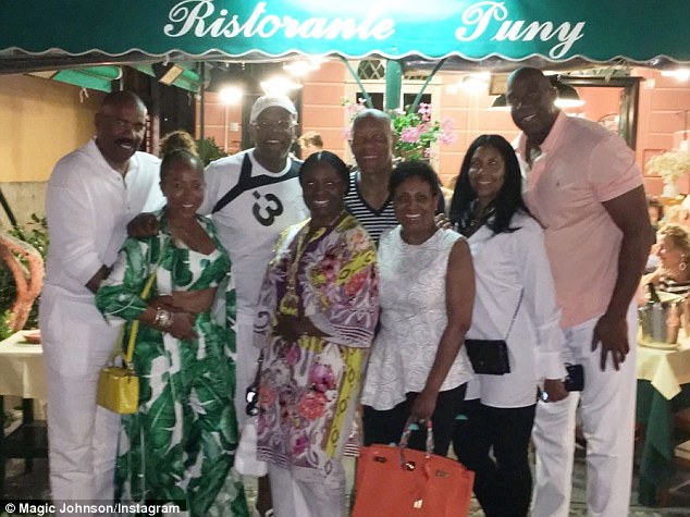 More friends, more fun: NBA icon Magic posted this snap outside the Ristorante Puny joined by their pals, entrepreneur John Palmer and wife Vicki, centre