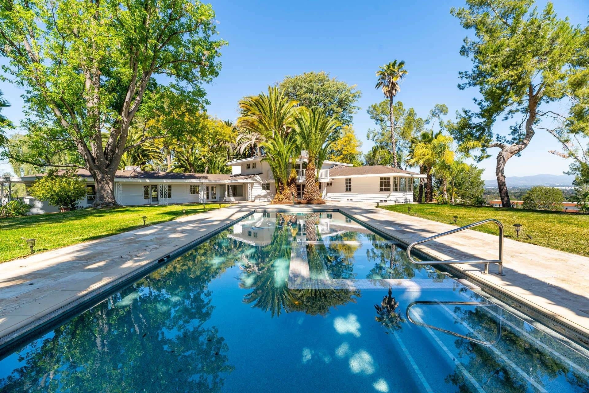  The home is spread across a sprawling four acres in Encino