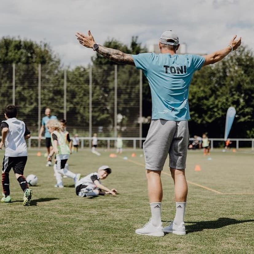 May be an image of 5 people, people playing football, people playing American football and text