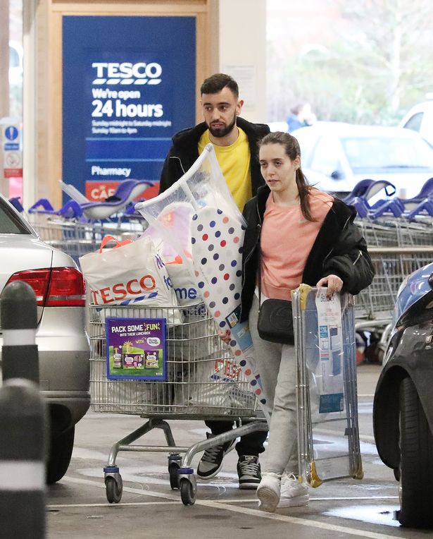 Man Utd star Bruno Fernandes pictured shopping at Tesco with his wife -  Daily Star