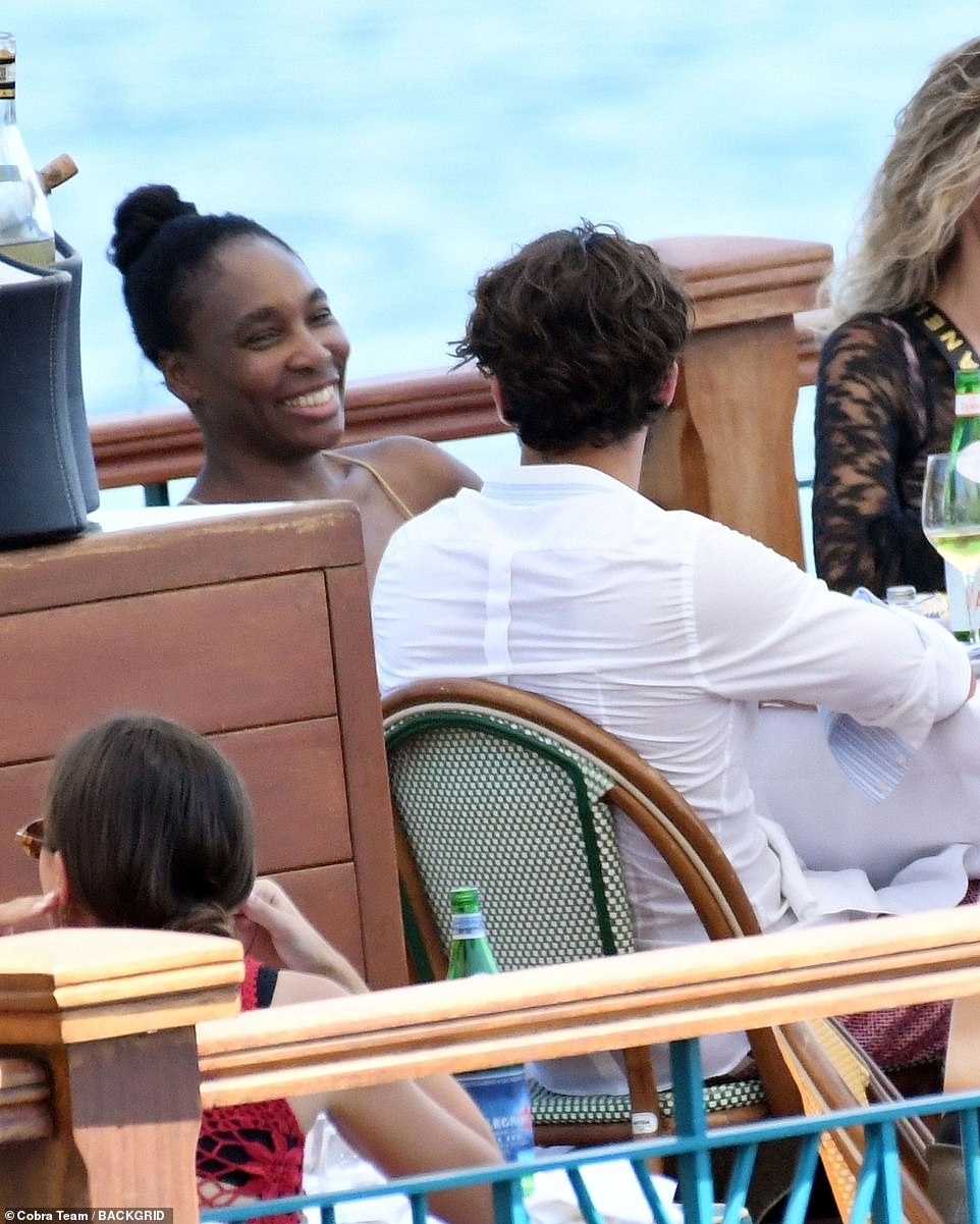 While taking in the stunning views of Amalfi Coast, the athlete, 44, and actor-director, 36, looked cozy as they whispered into each other's ears under the warm Italian sunshine