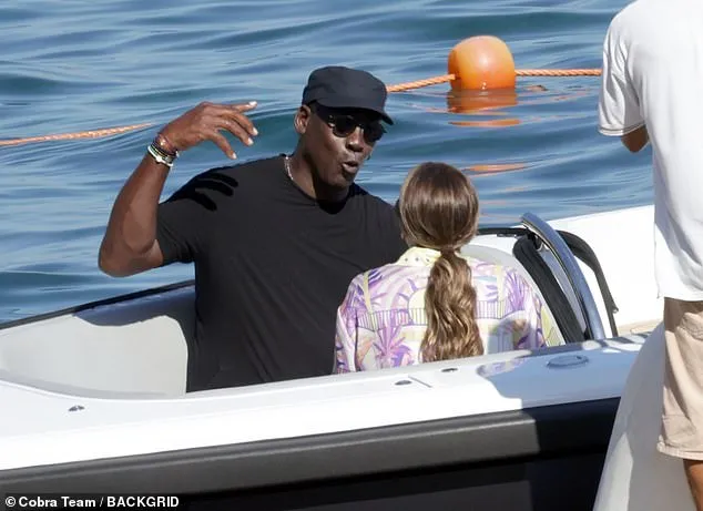 Cameras capture the moment Michael Jordan and his wife Yvette Prieto enjoy a shot of $399-a-bottle tequila on a 180-foot luxury yacht in Italy.