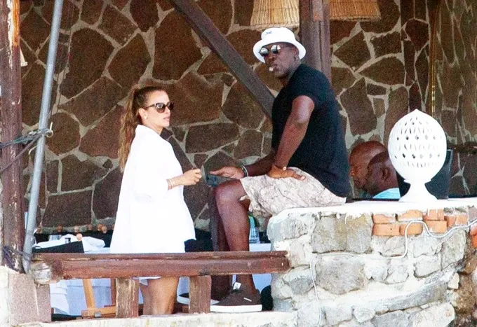 Cameras capture the moment Michael Jordan and his wife Yvette Prieto enjoy a shot of $399-a-bottle tequila on a 180-foot luxury yacht in Italy.