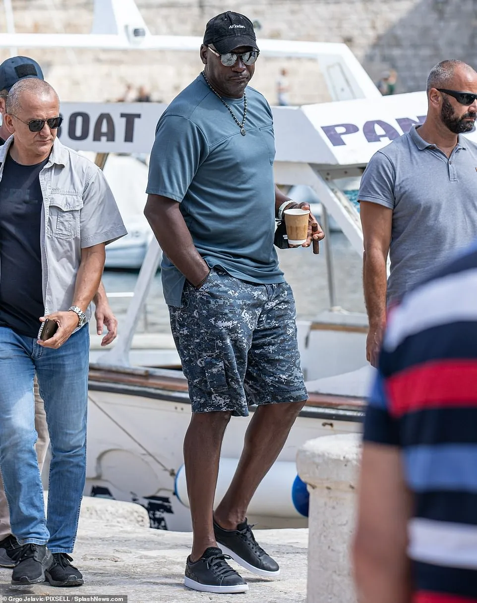 Cameras capture the moment Michael Jordan and his wife Yvette Prieto enjoy a shot of $399-a-bottle tequila on a 180-foot luxury yacht in Italy.