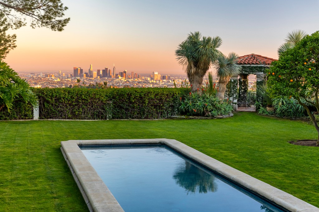 The pool overlooks the city.